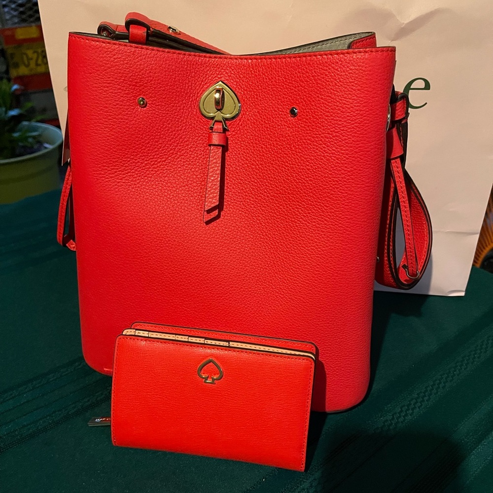 Kate Spade bucket purse with matching wallet.
